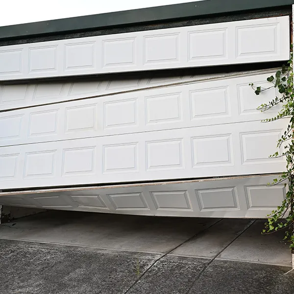 Garage door panels bent from a crash