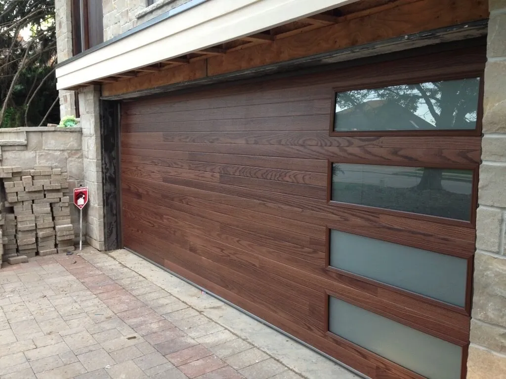 Wood panel garage door with frosted glass windows
